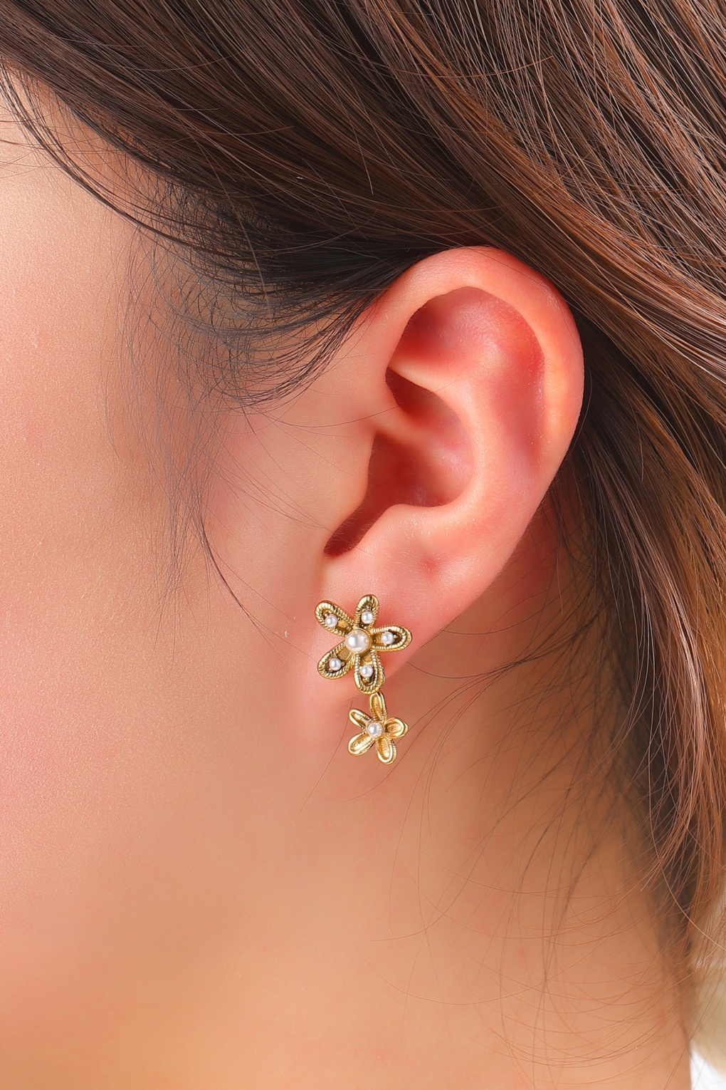 Double Pearl Flower oorbellen in goud